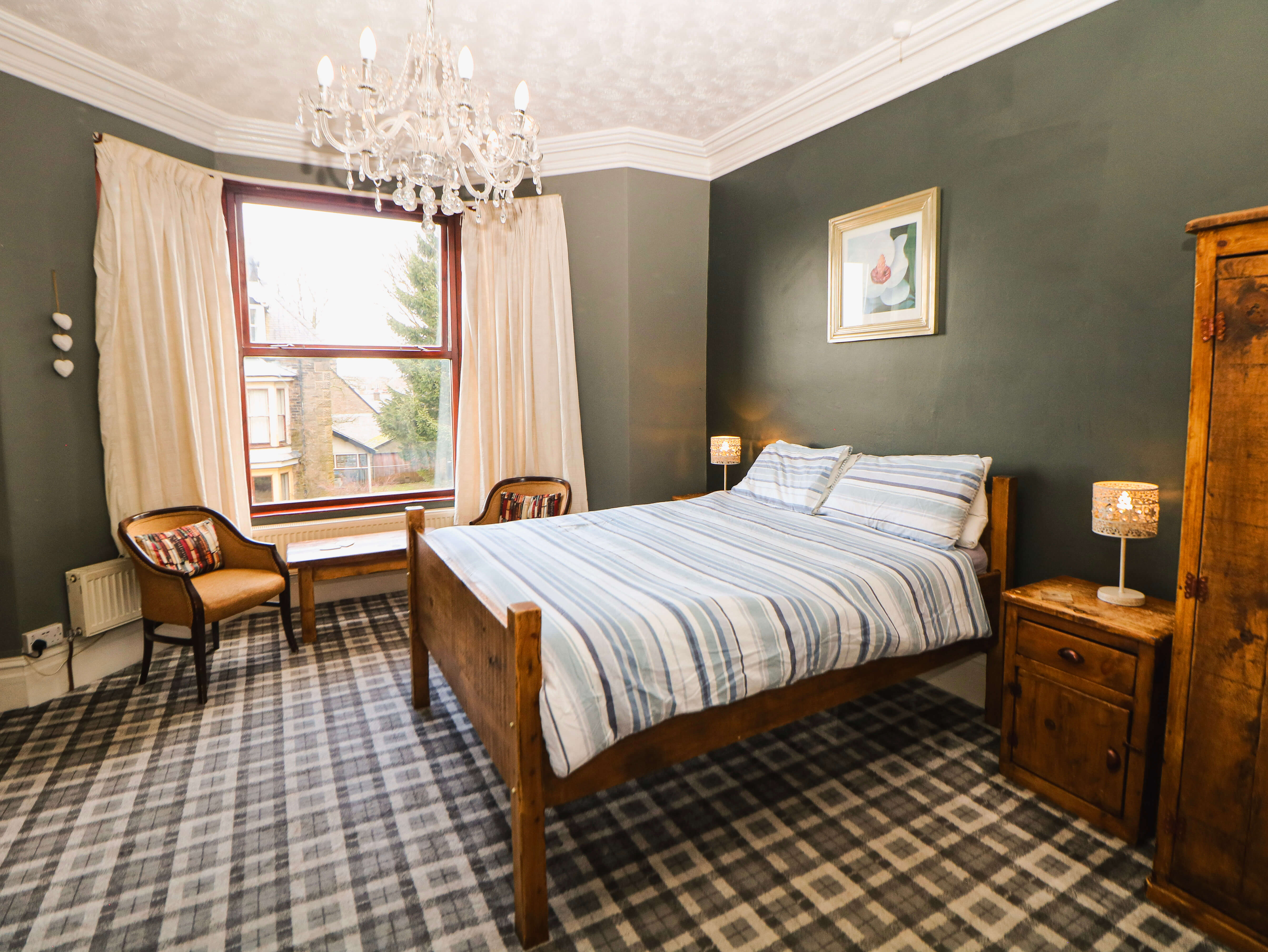 Large Room 3 double en-suite at Compton Guest House Buxton with Victorian fireplace and sash window